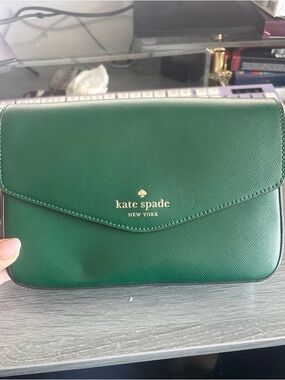 Kate Spade Emerald Green Brynn Crossbody Envelope Bag with gold logo